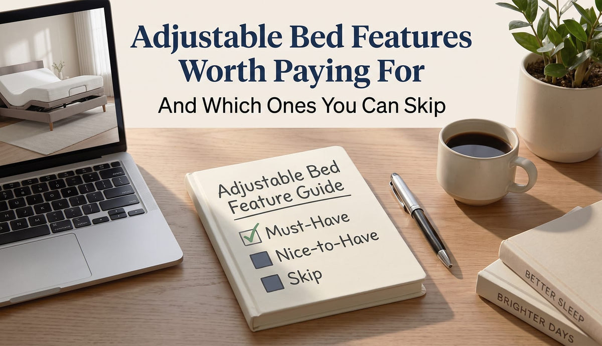 Notebook titled Adjustable Bed Feature Guide on a desk beside a laptop showing an adjustable bed