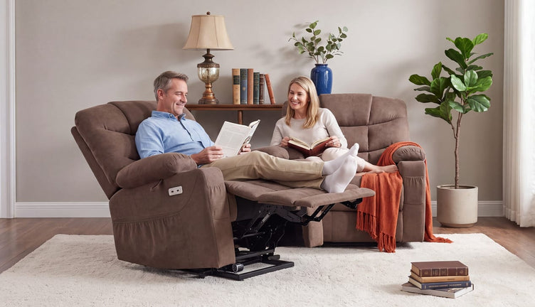 Couple reading in matching brown lift chairs in a bright living room