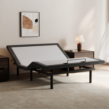 Tami Tami T600 Premium adjustable bed frame with the head raised and foot slightly elevated in a bedroom
